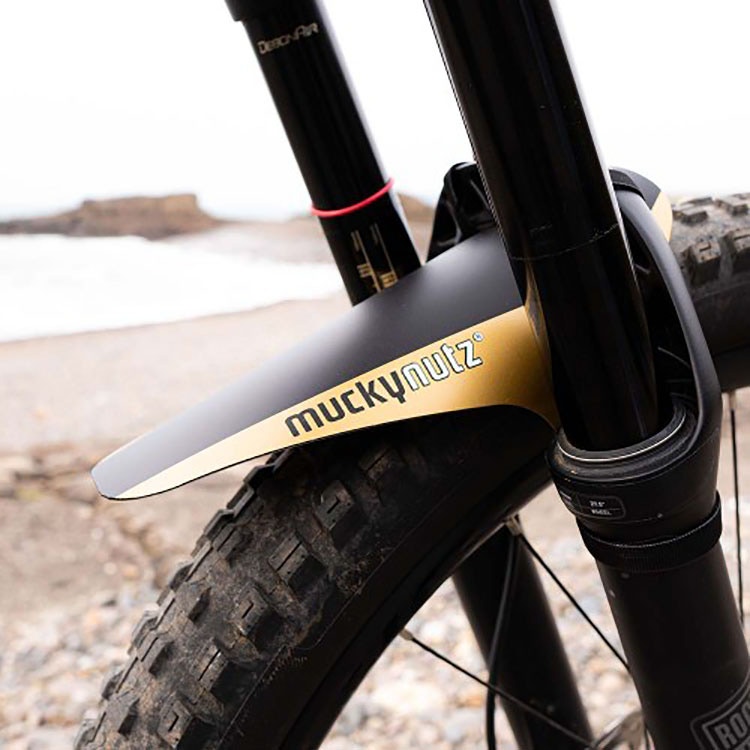Mucky Nutz Face Fender Black Gold SkateHut