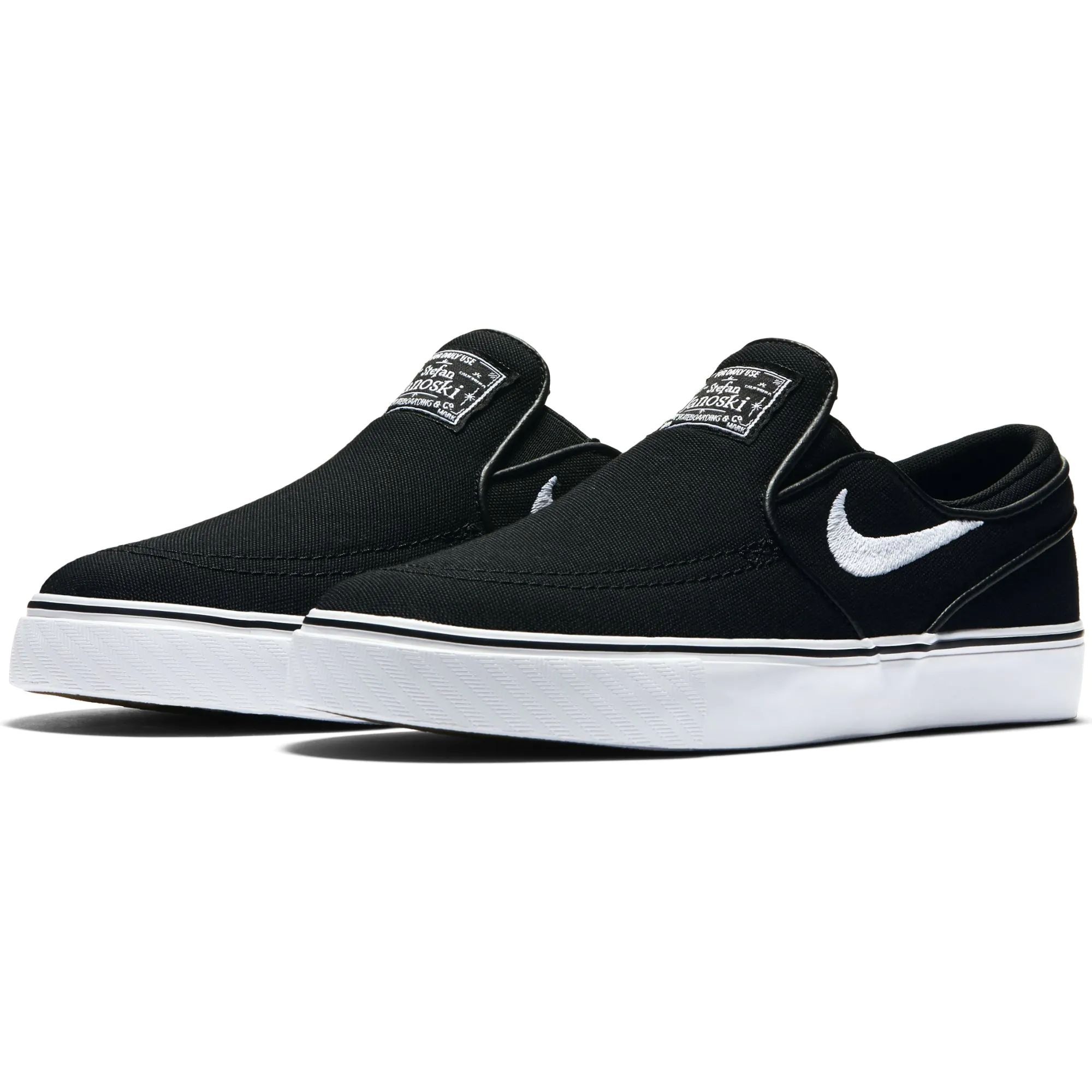 Nike SB Stefan Janoski Canvas Slip On GS Kids Skate Shoes Black White SkateHut