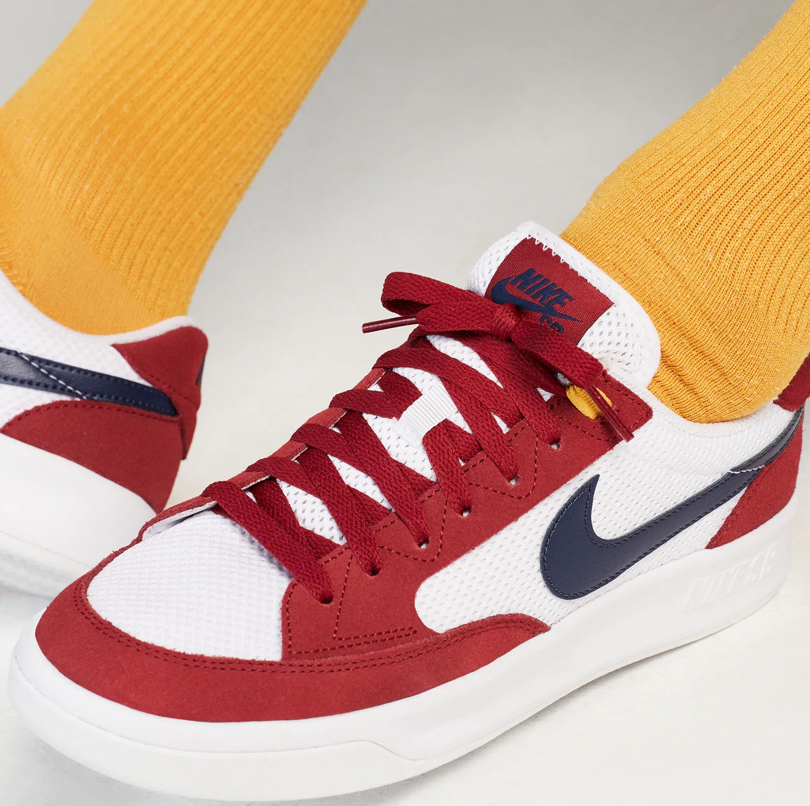 nike sb adversary white red