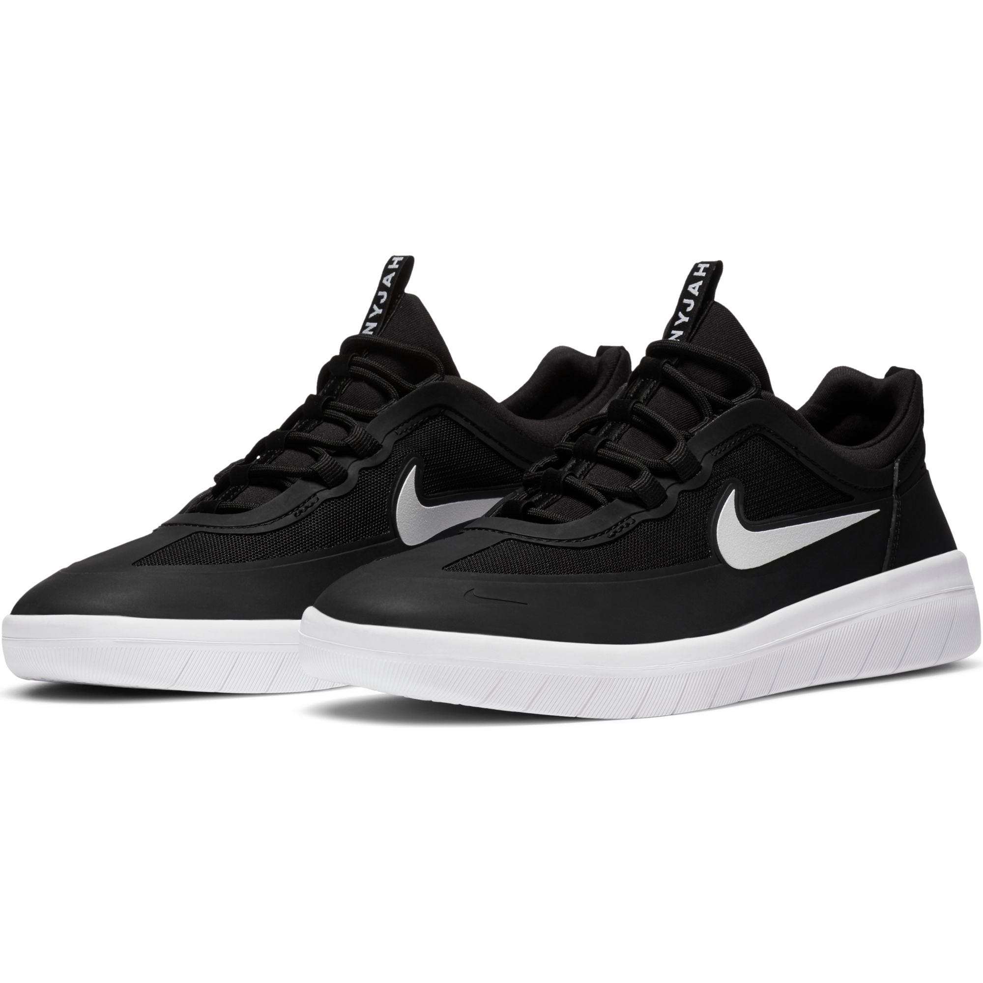 Sb nyjah free black  and  white skate shoes on sale